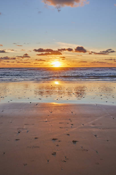 istock Dramatic sea sunset. The setting sun sinks into the sea 2008367518