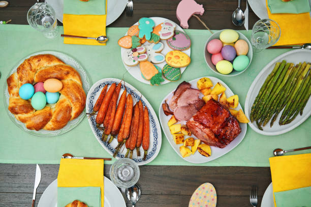 istock Easter Lunch with Roast Pork, Vegetables, Easter Cookies and Easter Cake 2008371809