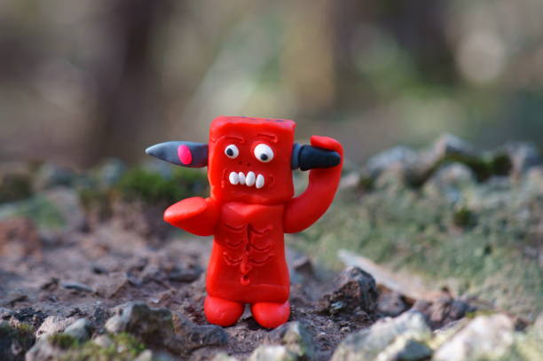 A toy zombie with a knife in his head.