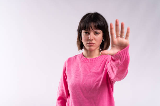 istock Woman gesturing prohibition and stop with hand 2008416834