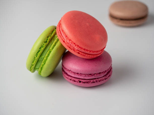 istock tasty macaroons on a white background. Side view. Delicious sweet dessert 2008428373