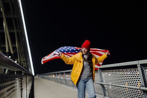 Beautiful Young Hipster Woman with USA Flag