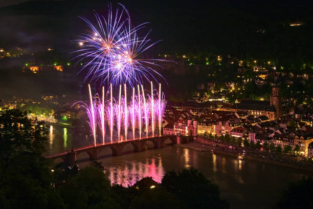 Heidelberg, Germany - May 20, 2013: Firework display at Karl Theodor Bridge. The Heidelberg Castle Lighting and Fireworks is annual event to commemorate the burning of the Heidelberg Castle by the French troops in 1693.