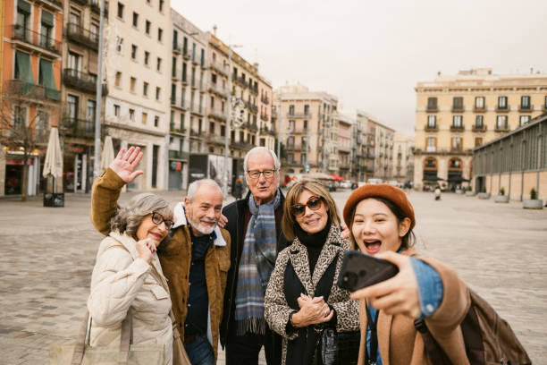 istock Tourist guide taking a selfie with group of seniors 2008502134