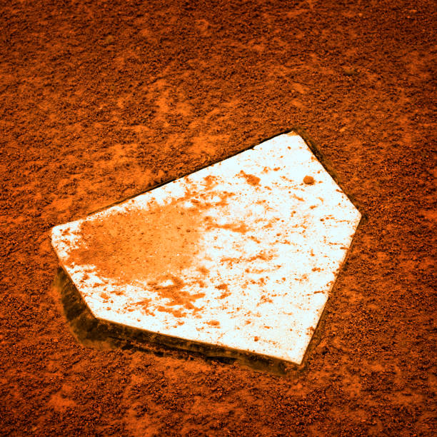 Baseball player running to first base