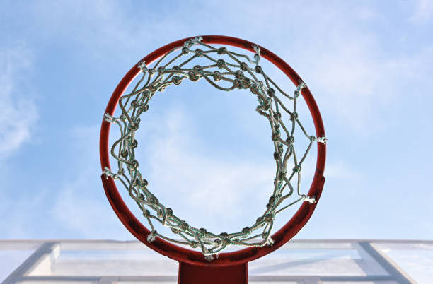 istock Empty basketball hoop basket over blue sky 2008520404