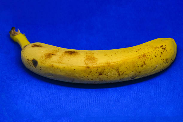 istock Yellow banana on blue background 2008523156