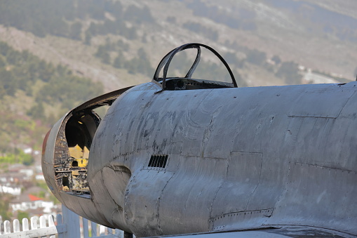 Old U.S. military Lockheed T-33 Shooting Star airplane landed and abandoned in Tirana airport in 1957, since 1970 on display at the top of the citadel as part of the Arms Exhibit. Gjirokaster-Albania.