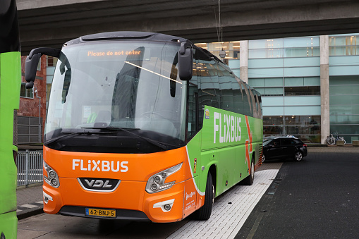 International bus of Flixbus waiting on busstation of Amsterdam Sloterdijk in the Netherlands