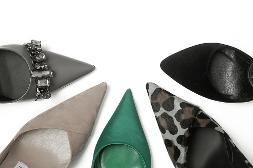 Studio shot of various leather pumps with pointed toe