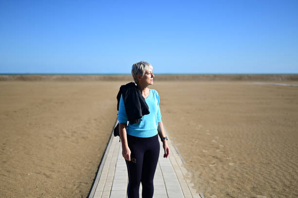 istock woman relaxing after jogging, 2008721224