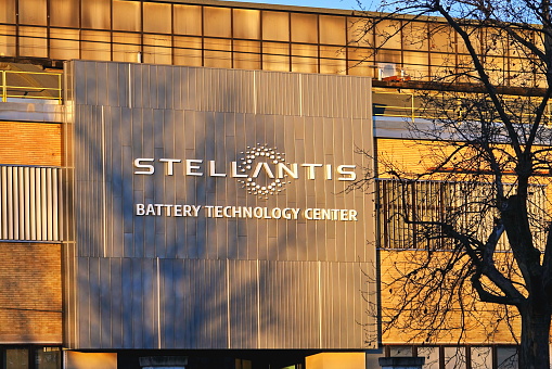 Turin, Italy - February 2024: The Stellantis logo at the entrance to the Mirafiori factory in Turin.