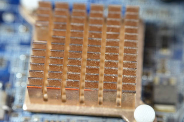 A closeup of a computer main board electronic motherboard, the main printed circuit board (PCB) in general-purpose computers and other expandable systems, allows communication of electronic components, selective focus