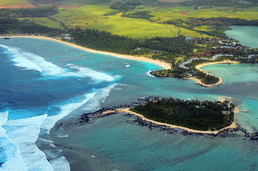 Le Chaland, Plaine Magnien / Plaisance, Grand Port District, Mauritius: Blue Bay Marine Park from the air - breaking waves of the Indian Ocean on the edge of the coral reef protecting the lagoon - a marine protected area in the southeast of Mauritius, the 353 hectare area was declared a national park 1997 and in 2000 it was granted Marine Park status, in 2008 it was designated a 