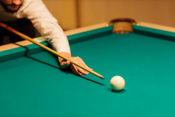 istock Billiard player at billard table or snooker american billiards pool sport game 2008903961