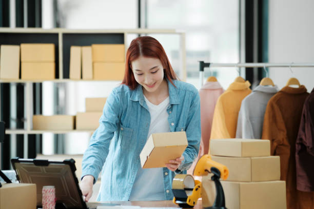 istock Online Shop Owner Managing Orders 2009036519