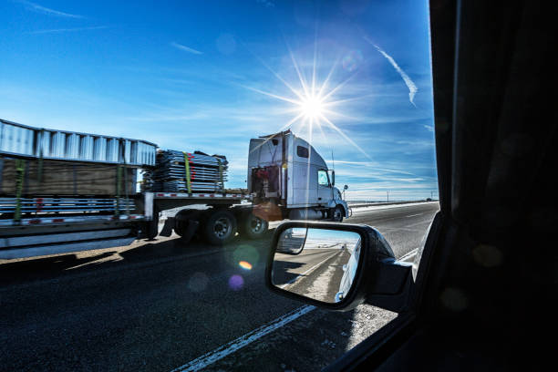 istock Trailer Truck Passing on Interstate 80 in Wyoming USA 2009078402