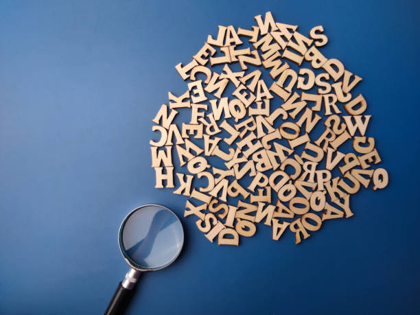 istock Top view magnifying glass and wooden word 2009099714