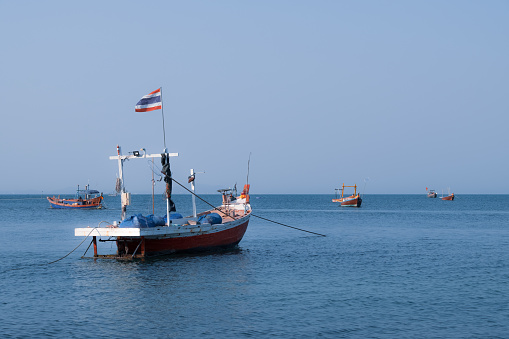 Fishing boats in the beautiful blue sea, Bang Saen, Thailand