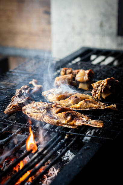 Grilled fish on charcoal stock photo