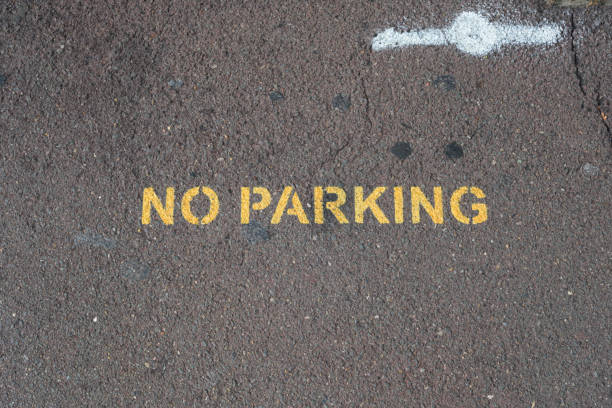 istock No parking written on the road 2009244581