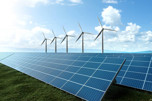 istock Solar Farm and Wind Turbine with beautiful blue sky background. 2009285742