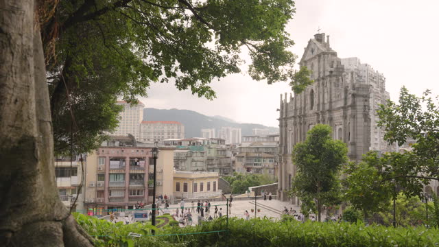 Tourist people visiting Ruins of Saint Paul's Cathedral travel landmark of Macau.
