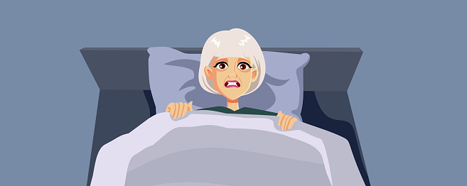 Scared granny trying to sleep suffering from bad dreams and insomnia