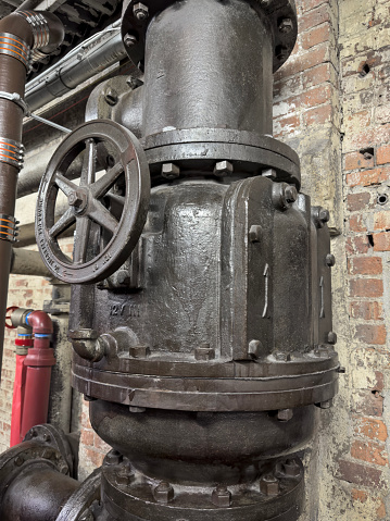 Old equipment at a destroyed coal-fired boiler with mechanical grate