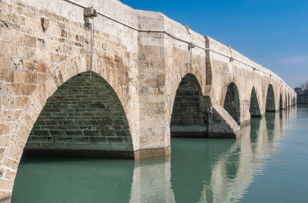 historical stone bridge and seyhan river. taskopru. adana, turkey.