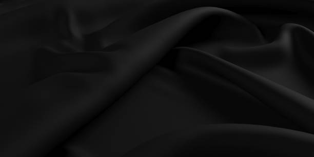 istock Black silk satin. Shiny smooth fabric. Abstract silk cloth background 2009436910