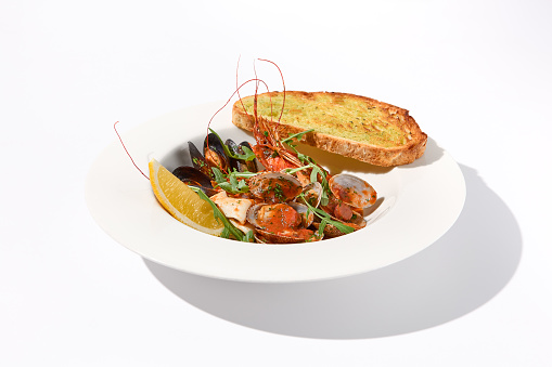 Seafood SautÃ© with Tomato Sauce and Ciabatta Crouton, a Delectable Medley for Seafood Lovers.