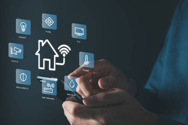 istock Man use smartphone to manage smart home features including security, lighting, and temperature. Smart home and Iot concept. 2009448539
