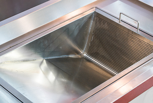 Clean dishwashing area in the kitchen of a hotel or restaurant