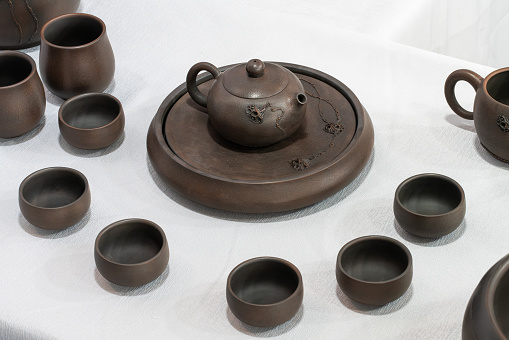 Traditional tea ceremony accessories Chinese clay teapot with green and puer tea Oriental tea ceremony