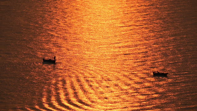 water surface of sea view with golden sunset in the evening, natural background