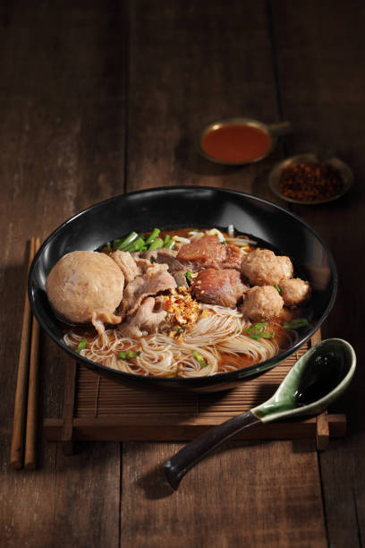 Chinese beef noodle soup. Taiwanese beef noodle on wooden background.