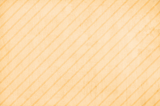 Empty blank very light brown or beige coloured grunge textured effect vector backgrounds with all over slanting smudged parallel line pattern. Suitable to use as vintage paper, post cards, letters, manuscripts templates. There is ample copy space and no people.