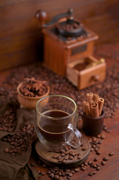 istock Tasty steaming espresso in cup with coffee beans. View from above. Dark background 2009613787