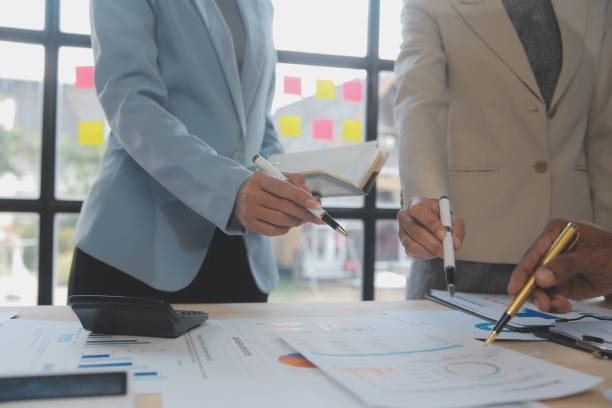istock Finance manager meeting discussing company growth project success financial statistics, professional investor working start up project for strategy plan with document, laptop and digital tablet. 2009621620