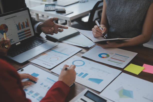 istock Finance manager meeting discussing company growth project success financial statistics, professional investor working start up project for strategy plan with document, laptop and digital tablet. 2009623734