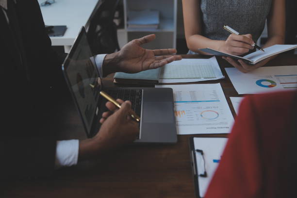istock Finance manager meeting discussing company growth project success financial statistics, professional investor working start up project for strategy plan with document, laptop and digital tablet. 2009623742