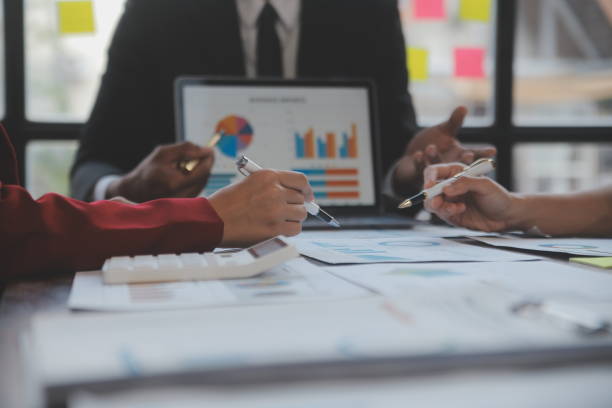 istock Finance manager meeting discussing company growth project success financial statistics, professional investor working start up project for strategy plan with document, laptop and digital tablet. 2009623756