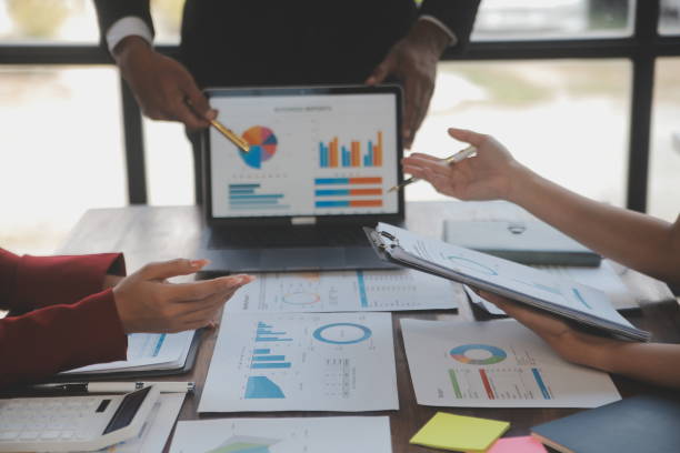 istock Finance manager meeting discussing company growth project success financial statistics, professional investor working start up project for strategy plan with document, laptop and digital tablet. 2009624291