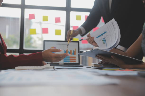istock Finance manager meeting discussing company growth project success financial statistics, professional investor working start up project for strategy plan with document, laptop and digital tablet. 2009625904