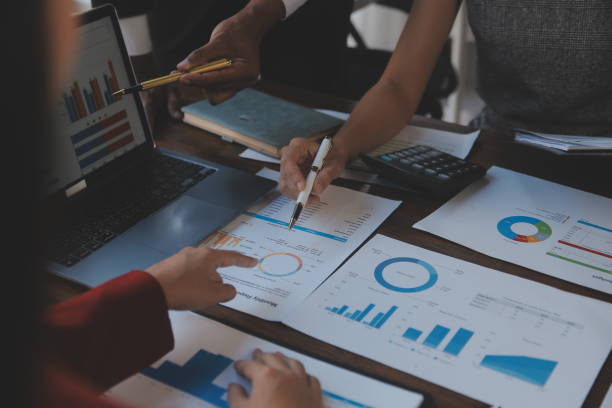 istock Finance manager meeting discussing company growth project success financial statistics, professional investor working start up project for strategy plan with document, laptop and digital tablet. 2009625934