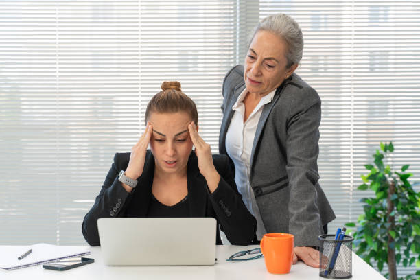 angry boss and tired unhappy woman employee, stress at work - threats rudeness occupation working - fotografias e filmes do acervo