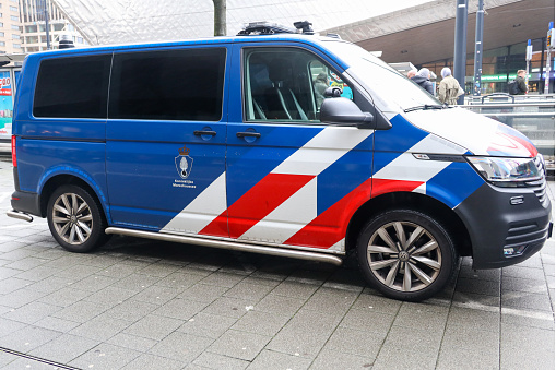 Vehicles of military police named Koninklijke Marechaussee at Rotterdam station as border guards in the Netherlands