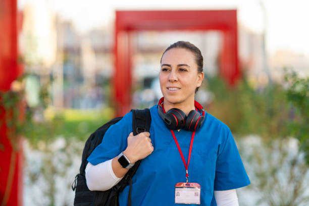 istock Female doctor walking to work in the morning 2009661122