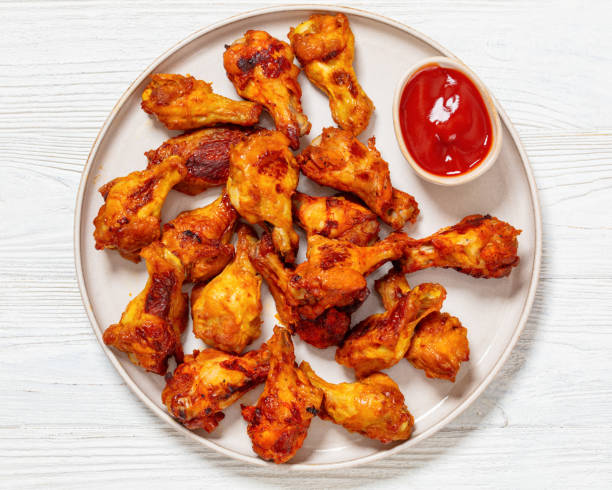 istock spicy crispy grilled chicken wings, top view 2009664836